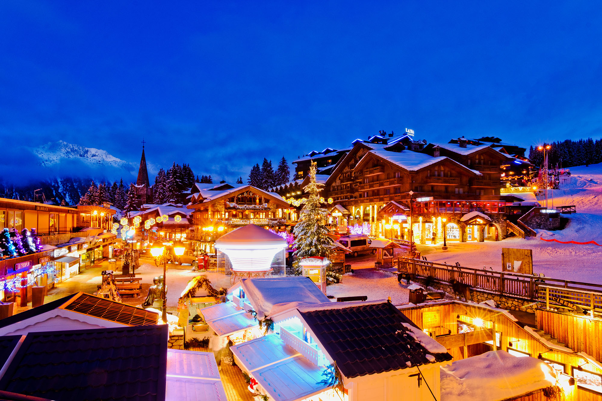 Evening View of Town & Le Croisette Area during winter season, Courchevel, France